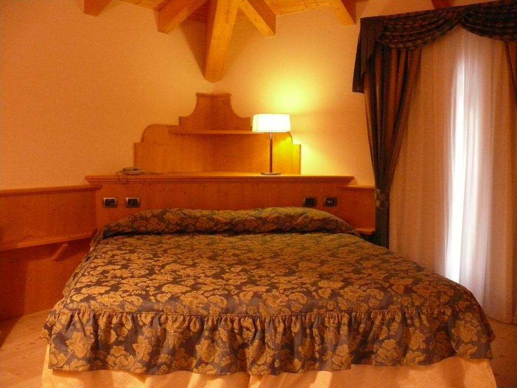La Quiete Resort Romeno Camera foto